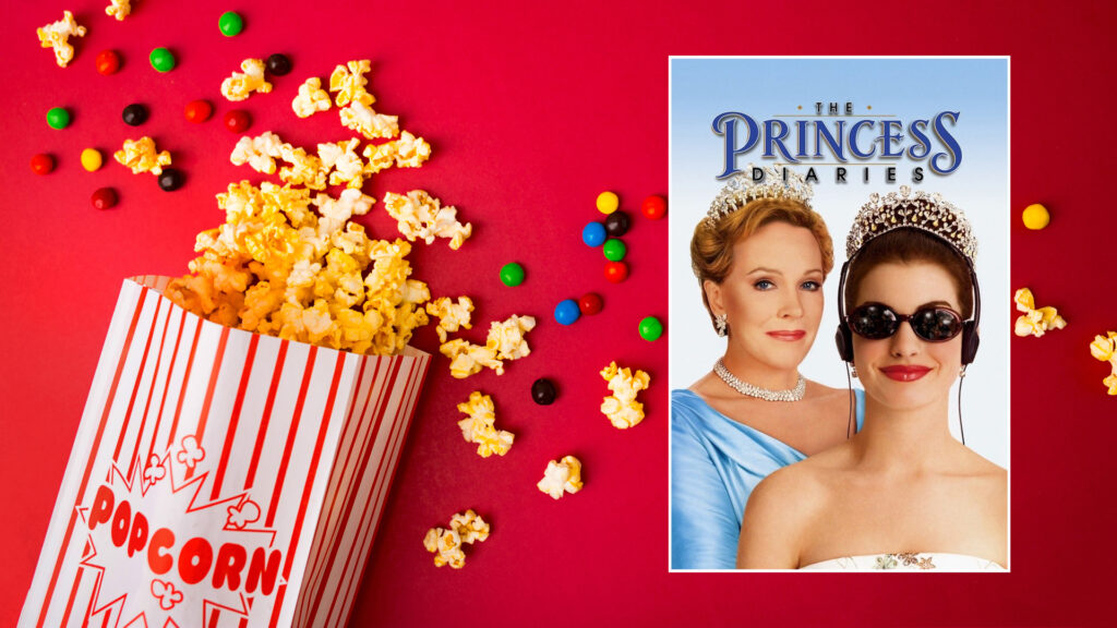 Box of popcorn and candy next to "The Princess Diaries" movie poster on a red background.
