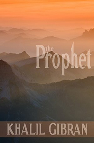 Cover of "The Prophet" by Khalil Gibran, featuring a hazy mountain range at sunset with the title in large text.