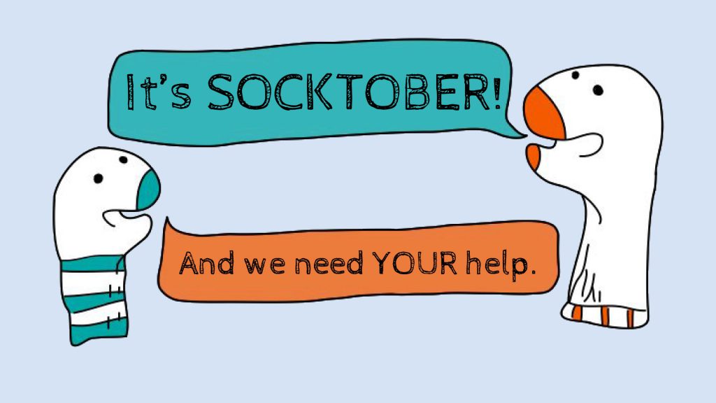 Two cartoon characters with speech bubbles: one says "It's SOCKTOBER!" and the other says "And we need YOUR help.