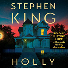 Cover of Stephen King's book "Holly" showing a lit-up house with a blue and red sky, text reads "Read by Justine Lupe.