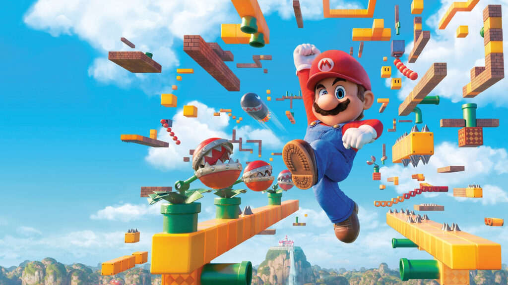 Mario jumps through a colorful platform world with blocks, pipes, and enemies against a bright blue sky.