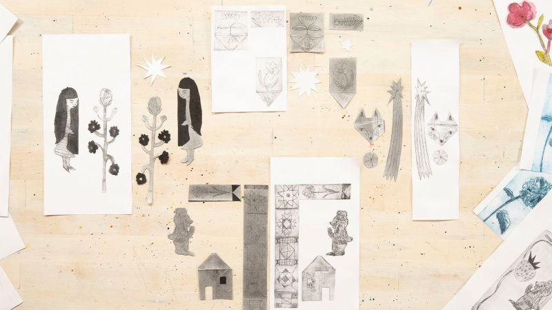 Illustrated artwork with various sketches and cutouts of people, flowers, geometric shapes, and small houses.