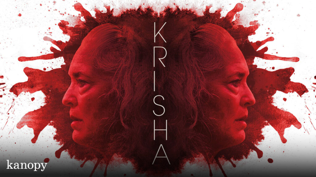 A woman's face mirrored on both sides with red splashes, and "KRISHA" written vertically in the center.