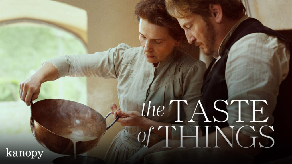 A woman pours sauce into a pot as a man watches; text reads "the TASTE of THINGS.