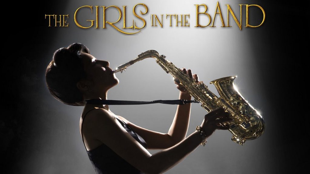 Silhouette of a woman playing a saxophone with "The Girls in the Band" written above in gold letters.