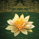 A luminous lotus flower floats on a dark water surface, with an intricate gold-themed background.