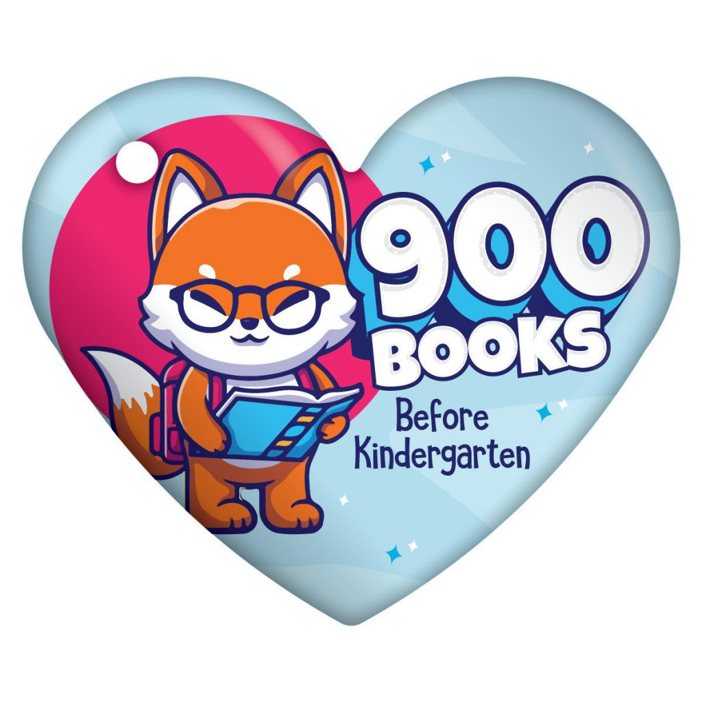 A heart-shaped badge featuring a bespectacled fox with a backpack and book, and the text "900 Books Before Kindergarten.